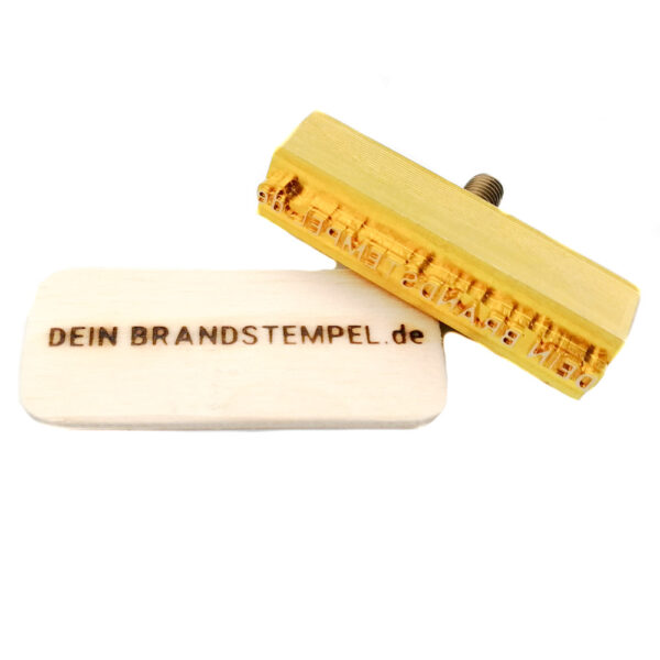 Motivplatte und Holzstück mit Brandzeichen/Brandmotiv